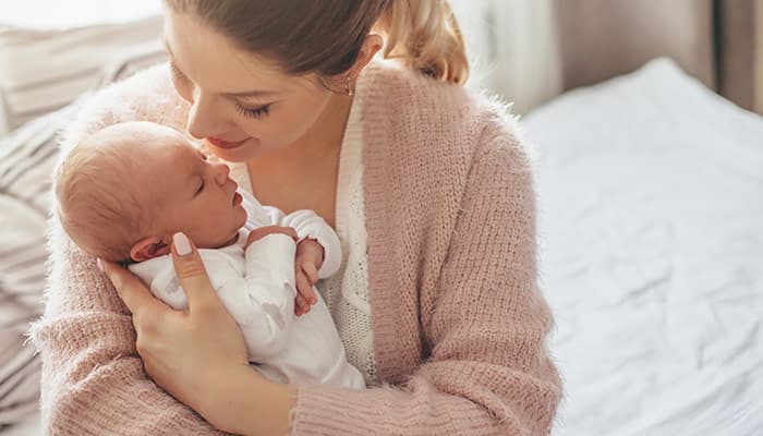 Mother with newborn baby